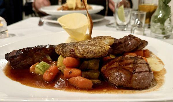 Ostrich, Elk and Kangaroo medallions with smashed potato and veggies.