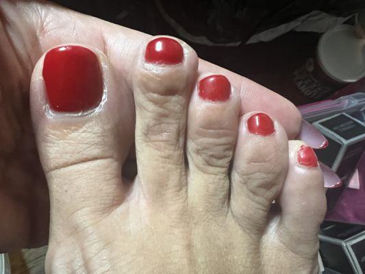 This is how my toes looked after a fresh pedicure from this place. I had to remove it all and redo myself