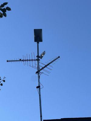 Tv antennas with Starlink & a cell phone booster.