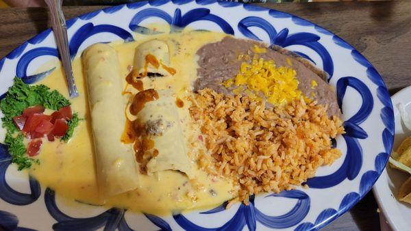 Beef enchiladas with queso sauce instead of enchilada sauce.