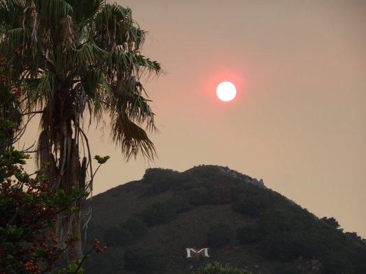 Smoky Sun from downtown San Luis Obispo. Do not look directly can burn Retina or Sensor!