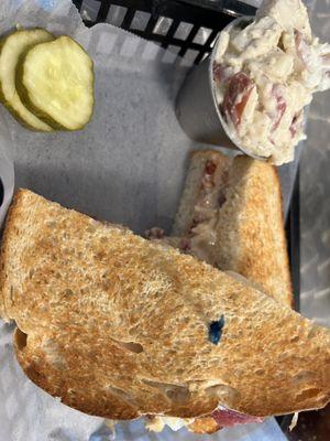 Reuben on sourdough with a side of potato salad