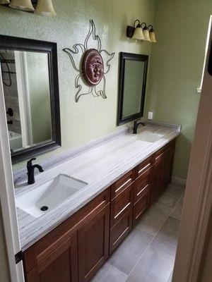 Granite Vanity top with rectangle under mounted sinks.