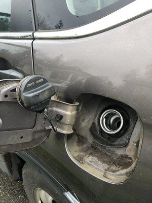 They forgot to cover my fuel tank cap , dangerous gas station!