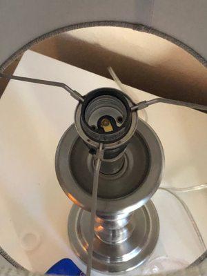 Missing bulb in lamp.