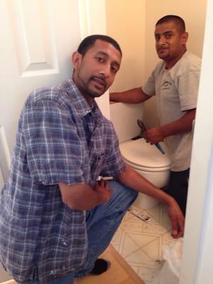 Nasir and Sunnel are fixing my toilet and my bathtub faucet!