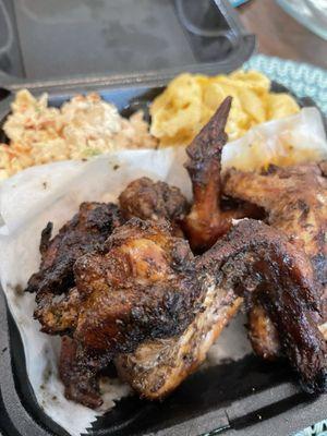 Smoked wings, seafood salad, macaroni and cheese