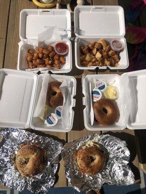 Everything bagel bacon egg and cheese, home fries, tater tots, and bagels with cream cheese. Really good!