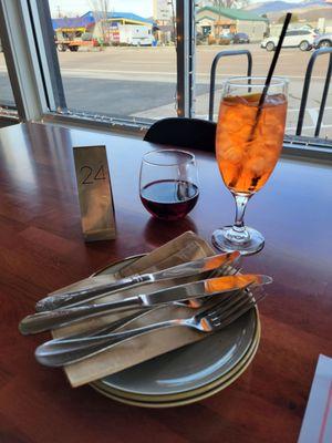 Aperol Spritz $8, Sangovese $6