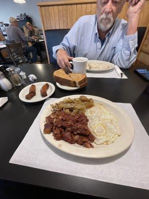 Corn beef hash and eggs with a side of sausage very good!