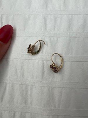 The earrings they "fixed". The part that closes is loose and wobbly and warped