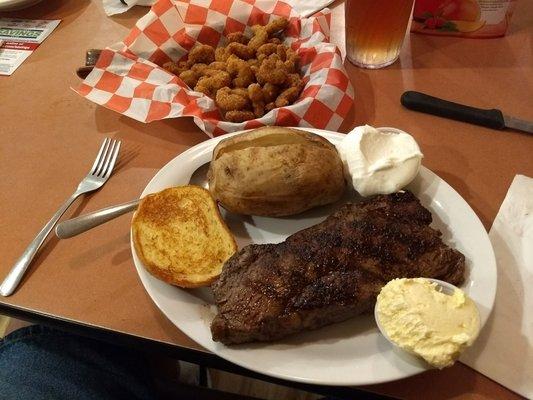 New York Strip steak, with shrimp and a side of backed potato.  I couldn't eat it all!