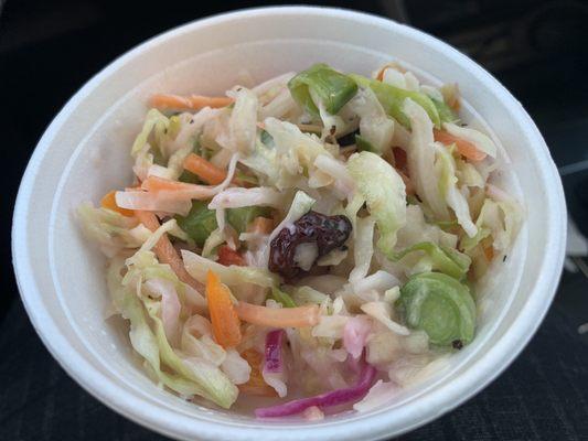 Different spin on coleslaw - kinda creamy and vinegary with craisins.