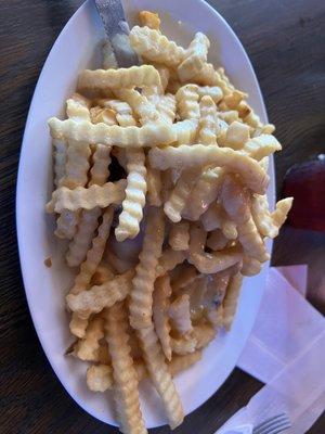 Pony shoe ( Texas toast grilled chicken cheese and French fries covered in cheese