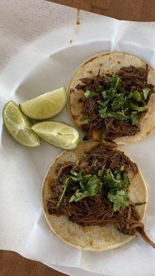 Two birria tacos