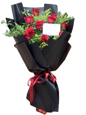 Dozen Ecuadorian roses wrapped an elegant paper