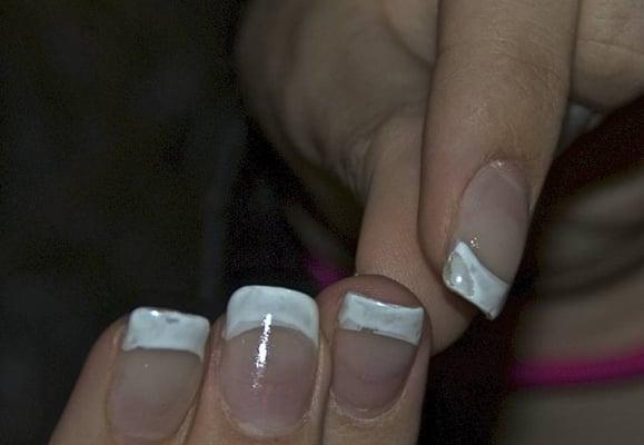 This is how my nails looked right after the manicure. Notice the two layers of white that do not line up... and missing white