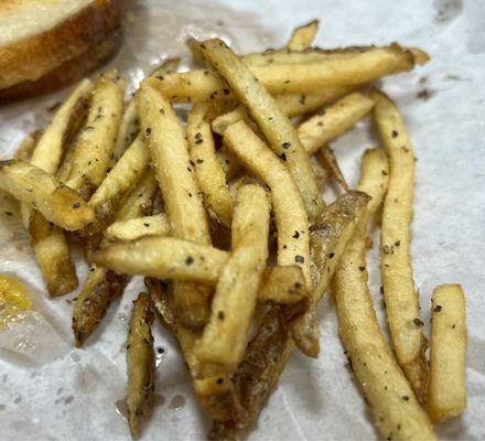 Well seasoned and fresh cooked, shoe string fries.  Very good and reasonably priced. Recommended!!!