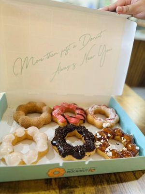 So cute!  Top row: churro; raspberry and strawberry funnel. Bottom row: original, chocolate and caramel.