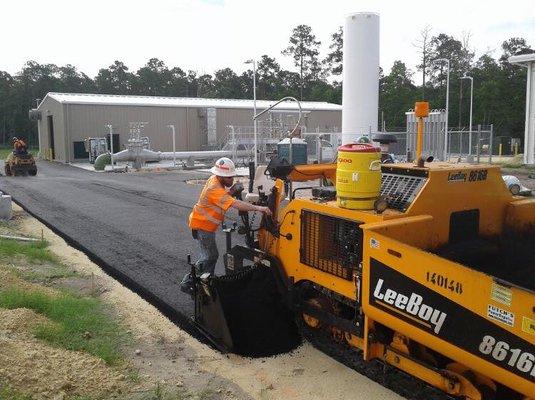 Installing new pavement.