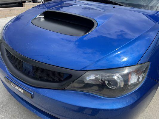 Restored the headlights back to its original shine, and painted the grill/scoop a matte finish.