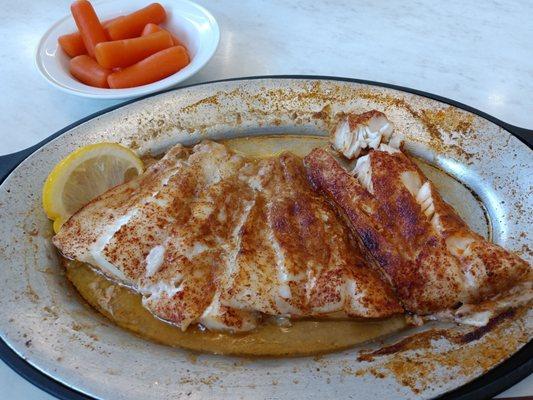 Broiled haddock with a side of baby carrots