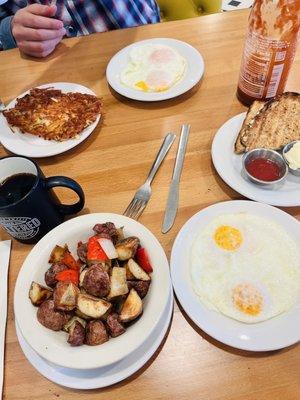 Eggs. Hash. Sunflower bread. Fries.