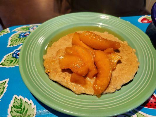 Oatmeal pancake with peaches.