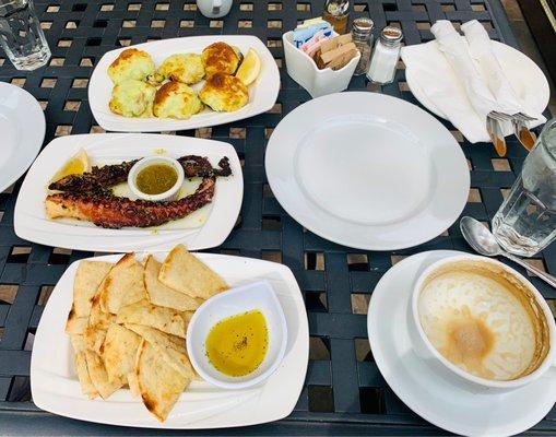 Grilled Octopus; stuffed mushrooms;pita bread.