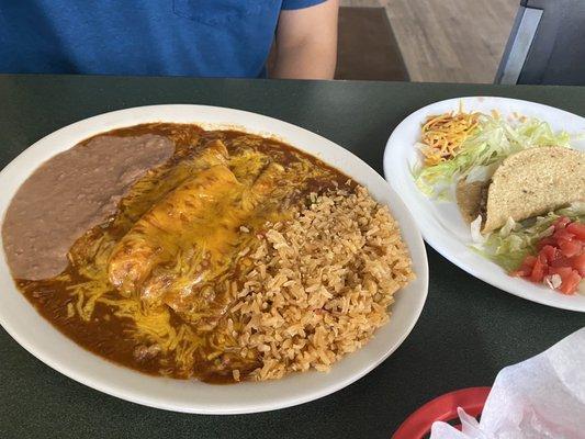 Combo with tamale, enchilada, crispy taco, rice and beans