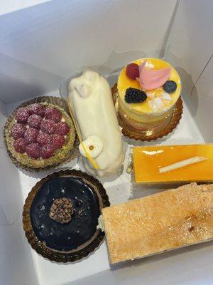 Raspberry Tartlette Passion Fruit Mousse Slice hazelnut cheesecake Strawberry Mille Feuille Lemon eclair Queen Emma cake