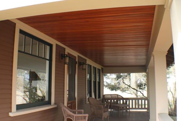 Another picture of the Palouse farmhouse depicting the full restoration of the original natural soffit using Sikkens Cetol.