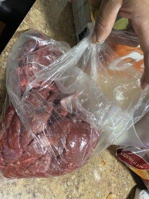 The disgusting glove they used to  pick the other meat they put The glove in the bag