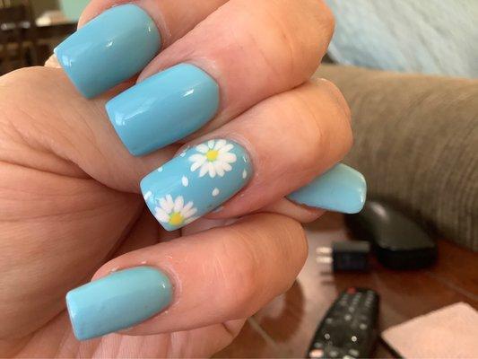 Today's nails done by Jon... Square shaped, med. length.  The lady did the daisy designs.. I love them for summer!..