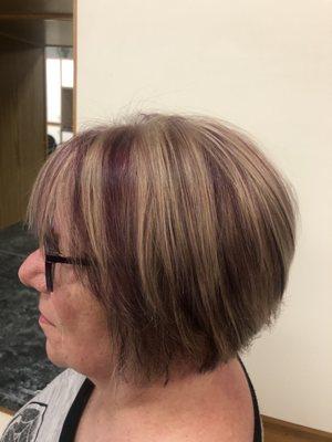 Purple with blonde highlights and a gorgeous haircut & style,