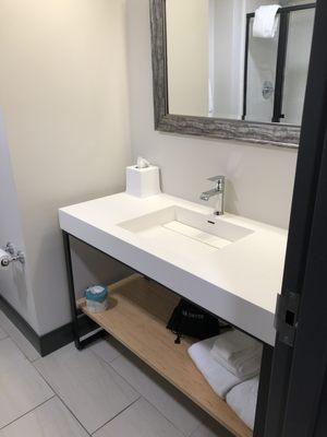 The sink/vanity in the bathroom