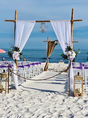 Beach wedding at sunset..