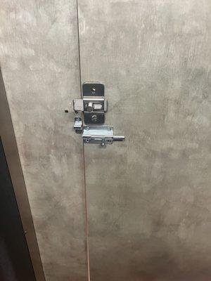 Broken locks on all bathrooms stalls