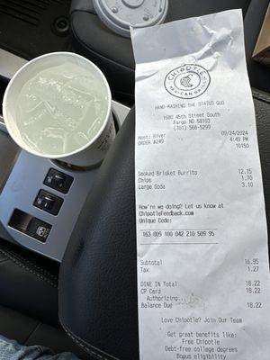 Receipt and large cup of water.