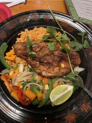 Cajun Catfish rice and seasonal vegetables.