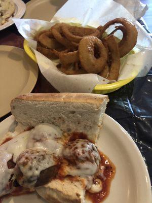 Meatball sub and onion rings.