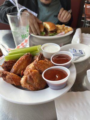 My sons burger, naked wings-sauce on side (my choice)