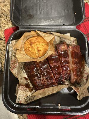 Saint Lewis ribs with macaroni and cheese and Coke slaw as sides and a biscuit.