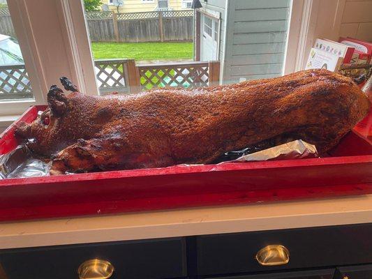 42 pounds for a whole pig! The red wooden tray is provided upon a $50 deposit that gets returned as soon as you bring the tray back.