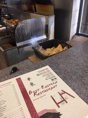 Left out for hours, they use their bare hands after handling money to put the wings in the fryer basket.