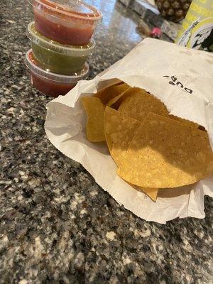 Take out Chips and 3 salsas-regular, hot, and salsa verde