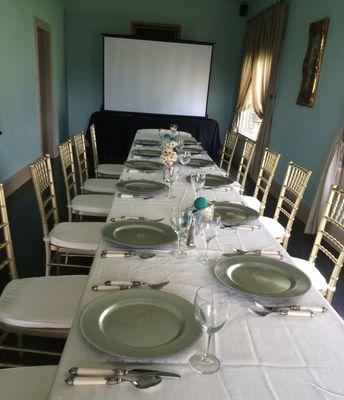 The Blue Room in The Ebony House.  Business meeting for 20 guests.