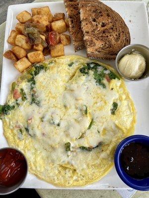 Scrambled eggs, potatoes and toast