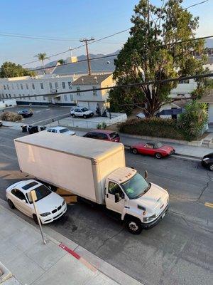 View of the truck from our original destination. Note we're 2 stories up without an elevator.