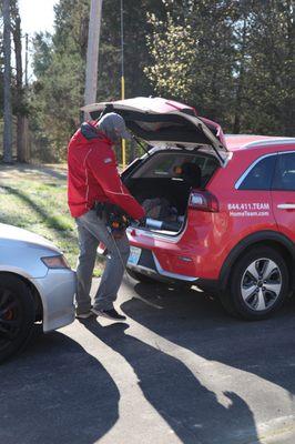 Inspectors arrive in company-branded vehicles.